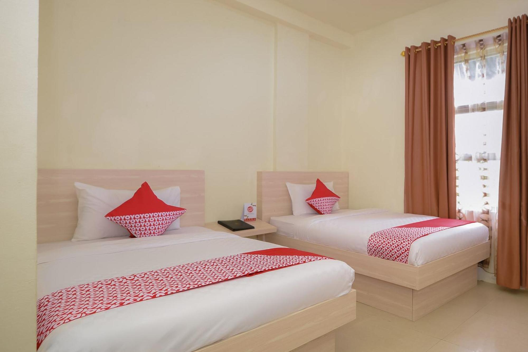 Capital O 854 Ub Caisar Hotel Banda Aceh Esterno foto